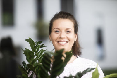 Portrait of smiling young woman