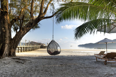 Built structure on beach against sky