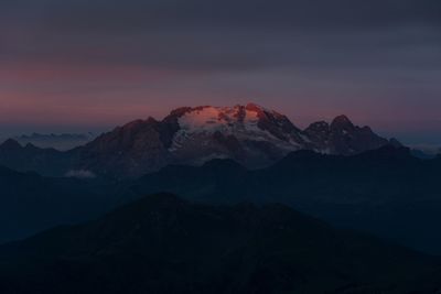 Scenic view of mountains against sky during sunset