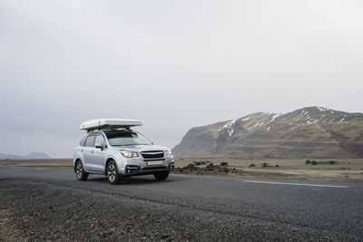 Car driving on road in iceland