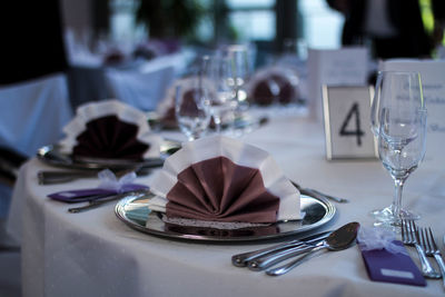 Plates and spoons arranged on table