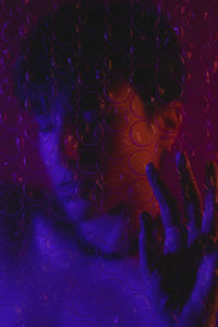 Defocused image of woman behind glass