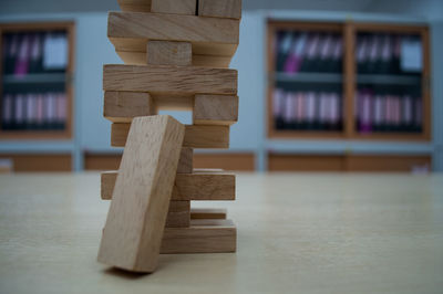 Close-up of books on wooden table