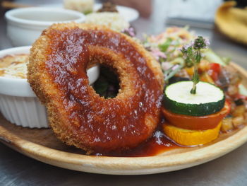 Close-up of burger in plate on table