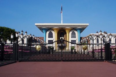 View of historic building against clear blue sky