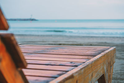 Close-up of wood against sea