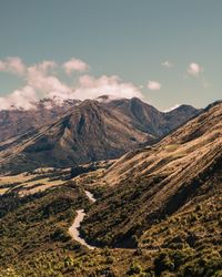 Scenic view of volcanic mountains against sky