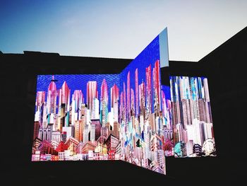 Close-up of multi colored building against clear sky