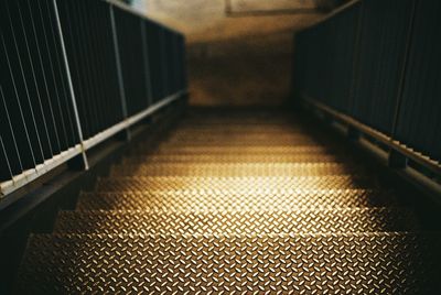 Close-up of illuminated metal railing