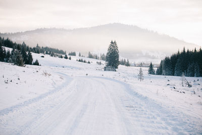 Panoramic view of landscape against sky during winter