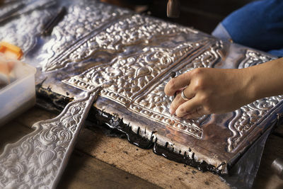 High angle view of person working on table