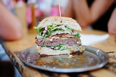 Close-up of burger in plate on table