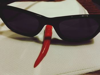 Close-up of sunglasses on table