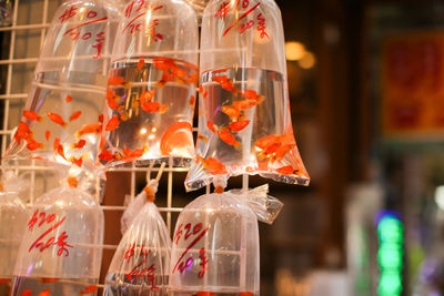 Close-up of illuminated lighting equipment for sale in market