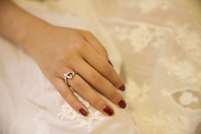 Close-up of woman hand wearing ring