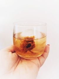 Close-up of hand holding drink