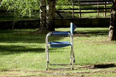 Empty bench in park