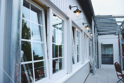 Reflection of building on glass door