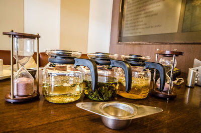 Close-up of kettles on table at restaurant