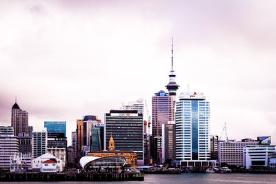 Buildings in city against sky