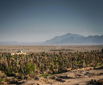 Scenic view of land against sky