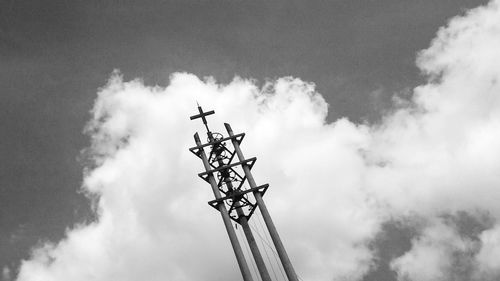 Low angle view of windmill against sky