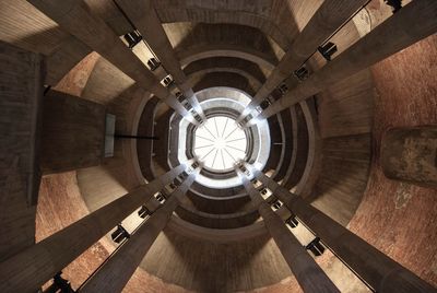 Directly below shot of spiral staircase of building