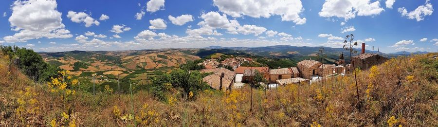 Panoramic shot of townscape against sky