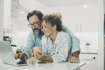 Female friends working at home