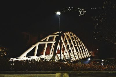 Illuminated street light at night