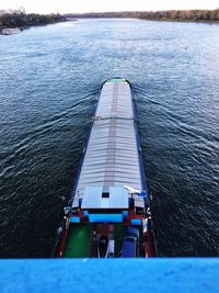 Boat sailing on sea against sky