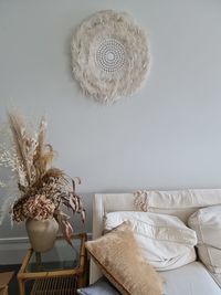 White flower vase on table at home