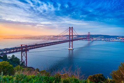 Sunset in lisbon with a wonderful view of ponte 25 de abril