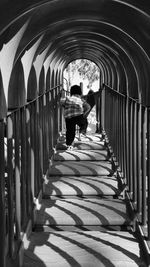 Man walking in corridor