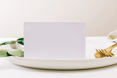 High angle view of blank papers on table