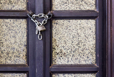 Close-up of closed door of old building