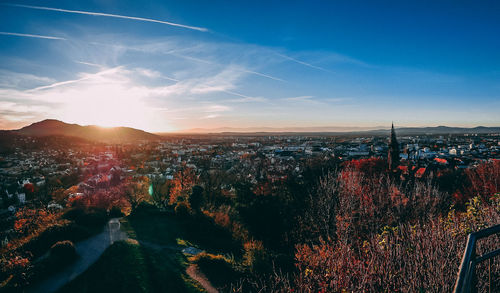 High angle view of cityscape against sky during sunset