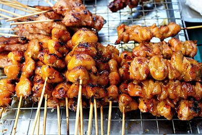 High angle view of meat on barbecue grill