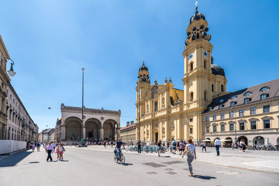 Group of people in front of historical building