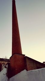 Low angle view of tower against clear sky