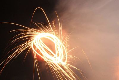 Low angle view of firework display