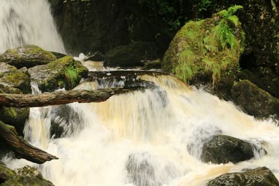 Stream flowing through rocks