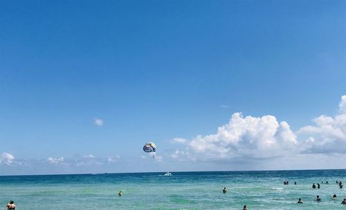 Scenic view of sea against blue sky