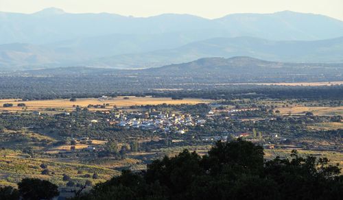 High angle view of townscape against mountains