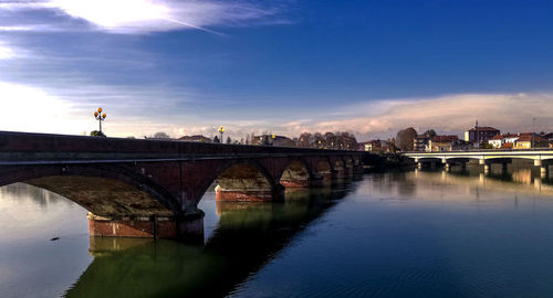 Arch bridge over river