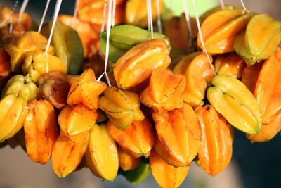 Close-up of bunch of starfruits