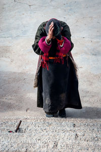 Full length of man in traditional clothes standing outdoors