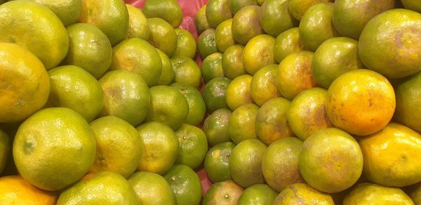 Full frame shot of oranges in market