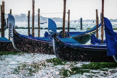 Gondola in venice. boats moored in canal