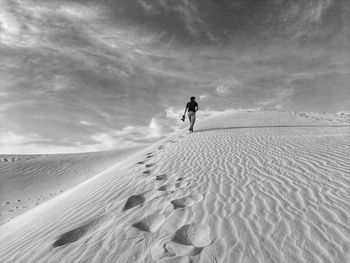 Walking on sand dunes